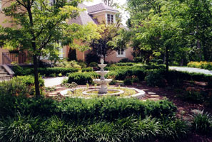 A colorful and low maintenance shade garden as an entry planting.