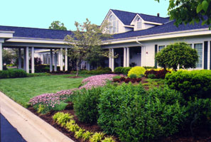 Springtime: right front main entrance Manor House (Mason Oh).